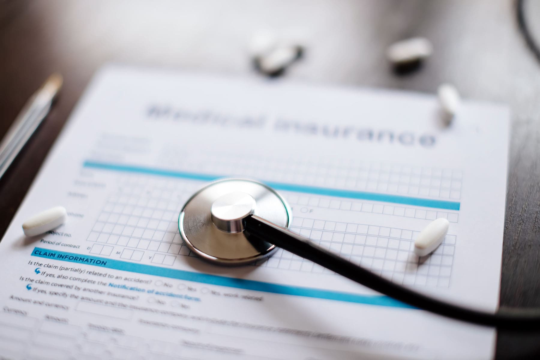 stethoscope-and-health-insurance-form-2024-12-02-08-00-17-utc