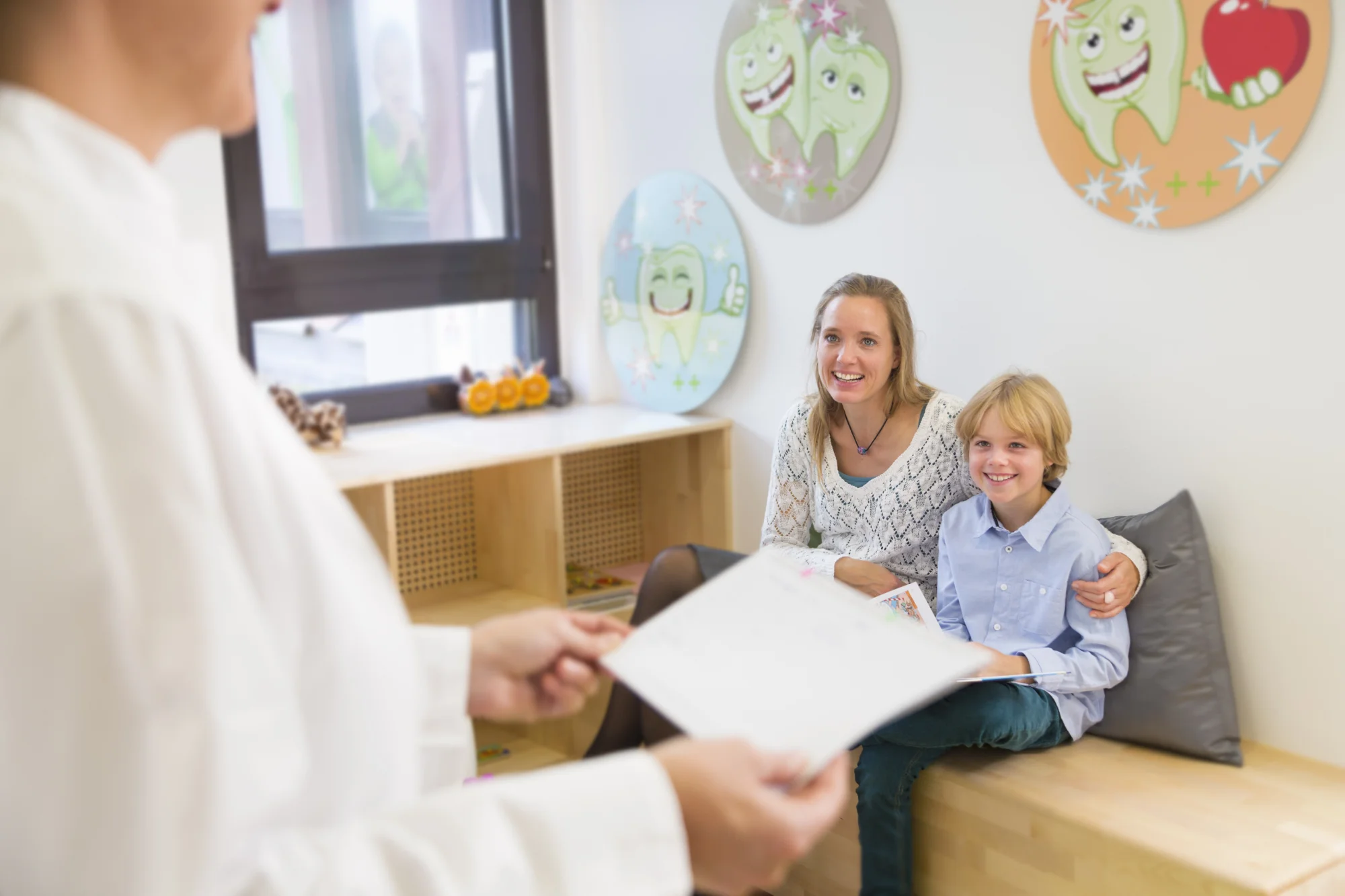 Dr. Jennie Chung is welcoming a child at Happy Bun Pediatrics clinic in McKinney, TX